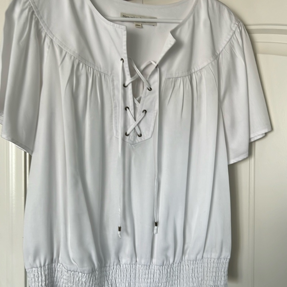 Adorable blouse from Anthropologie white, ties in front looks great on